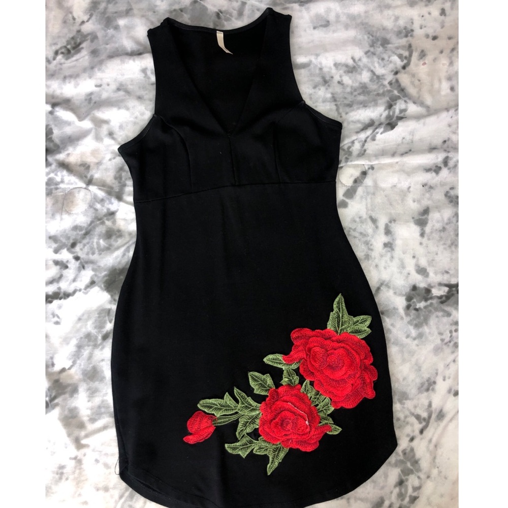 Black mini dress with embroidered flower